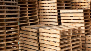 pile of wooden pallets stacked on top of each other